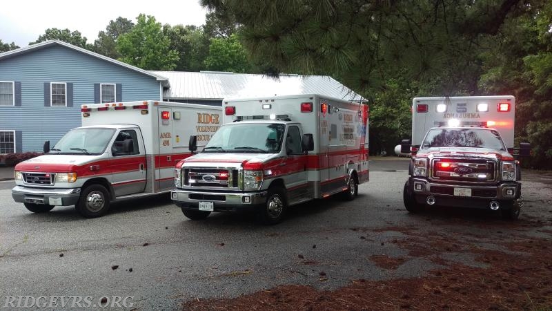 Ambulance 498, 496 & 499 at Co 49 Squad building.