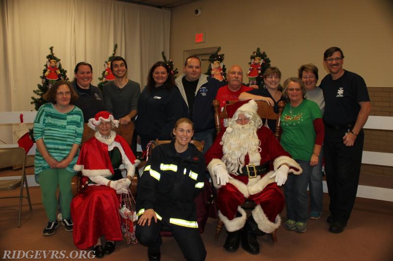 RFVD Tree Lighting 2016 - Co 49 members with Santa and Mrs. Claus.