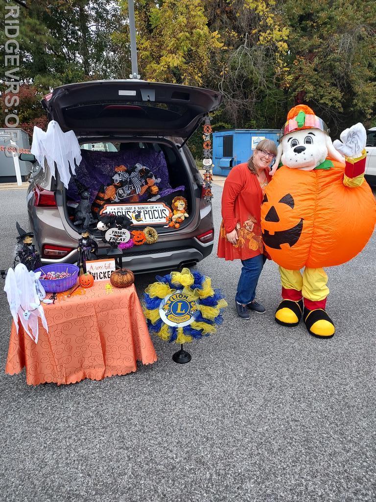 Supply Officer and Ridge Lions Club Secretary Christina with Pumpkin Sparky...